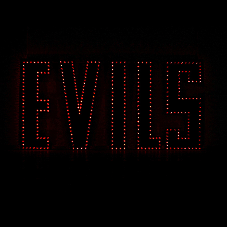 EVILS, 2004, metal,paint, light bulbs, sequencer, soundtrack loop,500x250cm