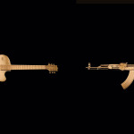 Fetishes, 2004, Guitar, AK47 replica, Gold Leaf.