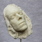 Newton face cast, expanding foam.